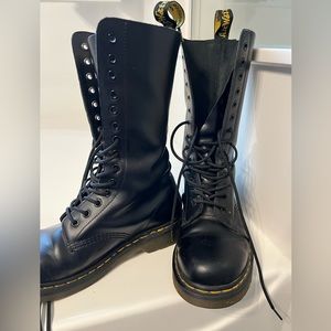 Dr Martens black leather boots.